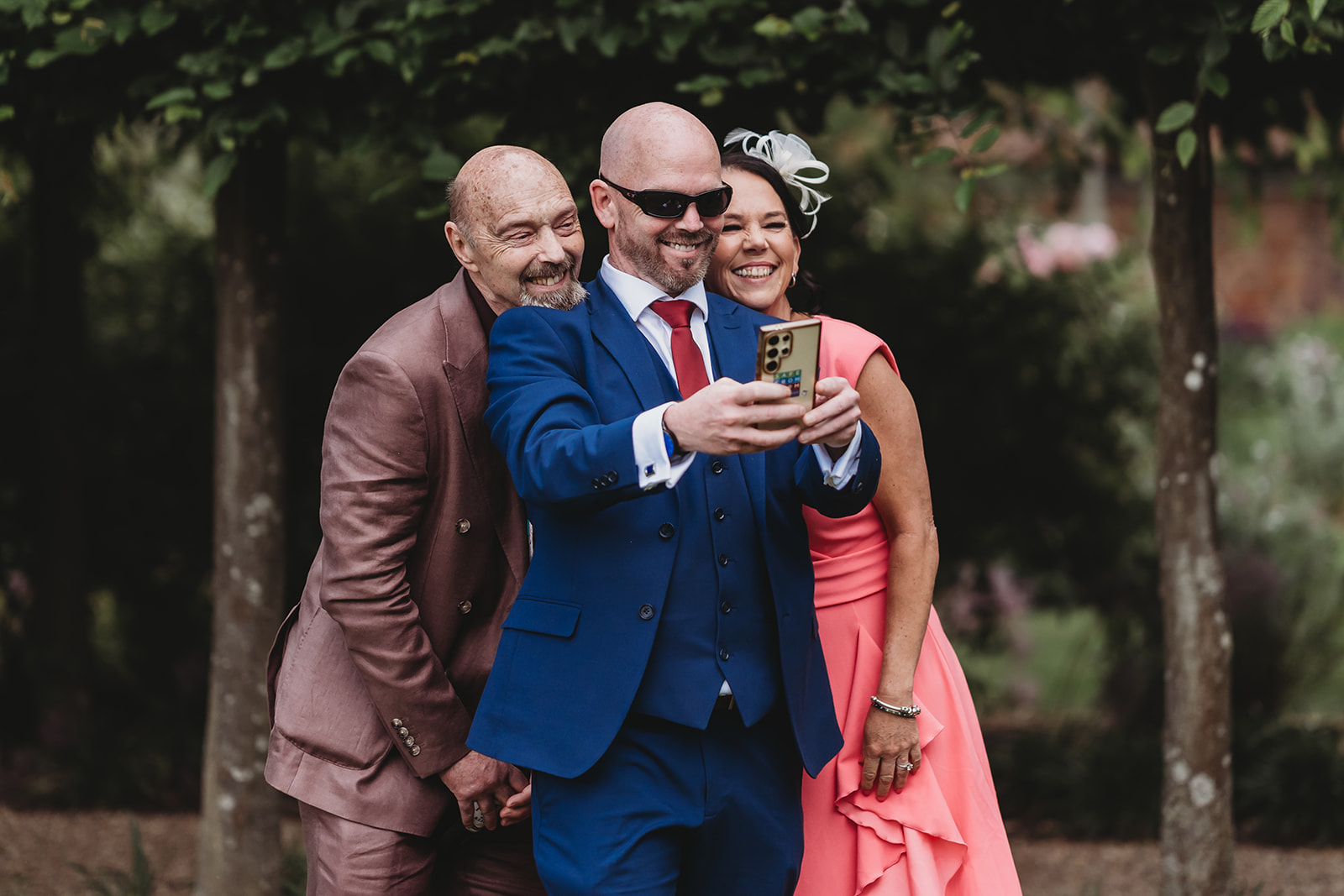 Drinks reception in the walled garden at a Braxted Park wedding